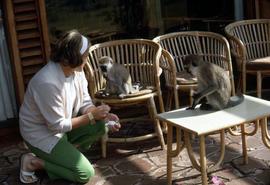 Phyliss Snider with two monkeys