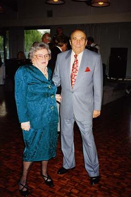 [Ben and Esther Dayson posing for the camera at an unknown event]