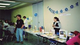 Hanukah [- library books on a table]