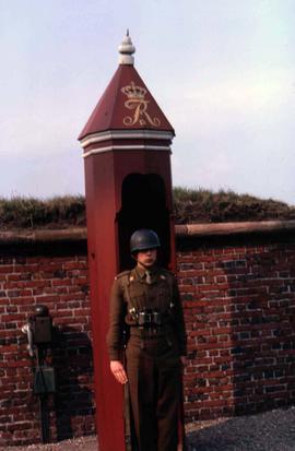 Soldier standing in front of his post