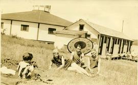 [Dave Schwartzman at the beach with Esther Nemetz?, and an unidentified woman and an unidentified...