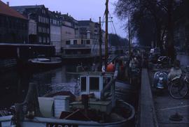 Boats docked in an urban setting