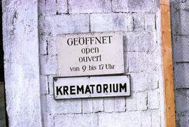 Two signs at the entrance of the Dachau Concentration Camp northwest of Munich, Germany, one show...