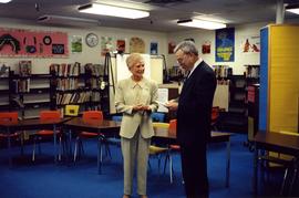 [Bernie Simpson and an unidentified woman in an elementary school classroom]