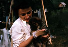 Phyliss Snider holding a puppy