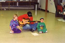 [Purim (possibly) - children singing]