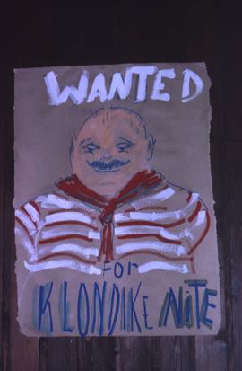 Painting of a man with the words: "Wanted For Klondike Nite"