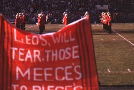 Sign made out of orange material with black stripes and the words "Leos, will tear, those Me...