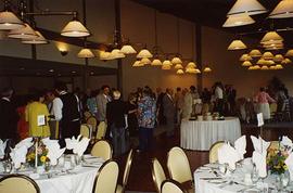 [Unknown people standing around a dining room for an event likely at the Richmond Country Club]