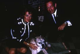 Phyliss Snider, an unknown man and a dog posing for the camera