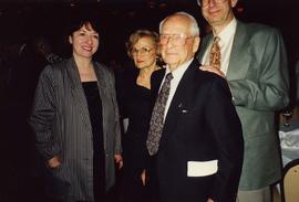 [Dr. Irving and Phyliss Snider and an unknown man and woman on either side of them]