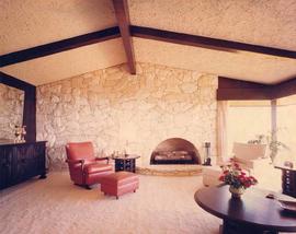 Stone fireplace, hearth and living room, the Ross residence, Vancouver, BC