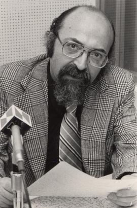 Chaim Potok with microphone