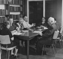 Residents reading at the Jewish Home for the Aged