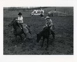 [Two Cowboys on Horses]