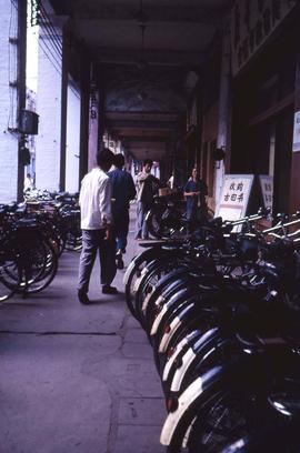 Walkway filled with bicycles