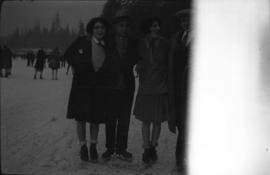 Group of skaters on ice outside