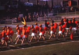 BC Lions' cheerleaders walking across football field