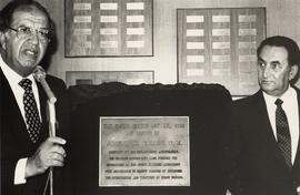 [Joseph H.] Cohen and Mr. Pezim with plaque