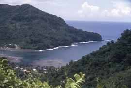 View of green mountains encompassing an inlet