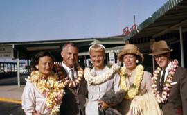 Phyliss Snider and four other unknown people wearing leis