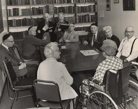 Residents around table at the Louis Brier Home