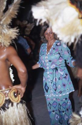 Phyliss Snider participating in a dance alongside the performers