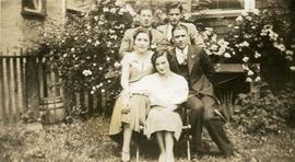 Esther Nemetz and Ben Dayson [seated in a garden with Florence Nemetz? and Bill Nemetz?]