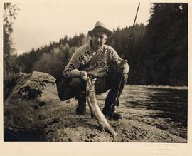 Fisherman holding the catch of the day