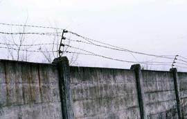 Wall outfitted with wires, a section of the Dachau Concentration Camp