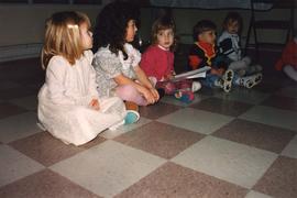 Children sitting on floor