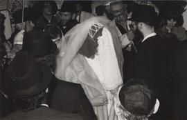 Bride under the Chupa at a traditional chassidic wedding