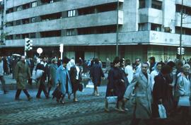 People crossing a busy intersection in Romania